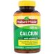 Кальций и витамин Д Nature Made (Calcium with Vitamin D) 400 МЕ 600 мг 100 капсул фото